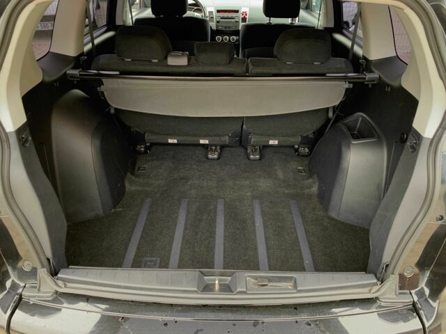 Черный Мицубиси Аутлендер, объемом двигателя 2.4 л и пробегом 175 тыс. км за 10499 $, фото 13 на Automoto.ua