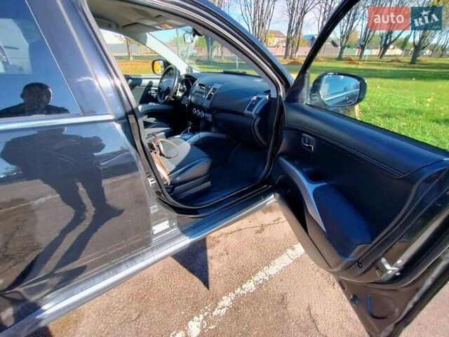 Міцубісі Аутлендер 2009 у Житомирі на Automoto.ua Чорний Міцубісі Аутлендер, об'ємом двигуна 2 л та пробігом 251 тис. км за 8400 $, фото 17 на Automoto.ua