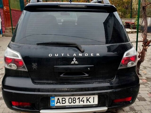Черный Мицубиси Аутлендер, объемом двигателя 2 л и пробегом 280 тыс. км за 5800 $, фото 5 на Automoto.ua