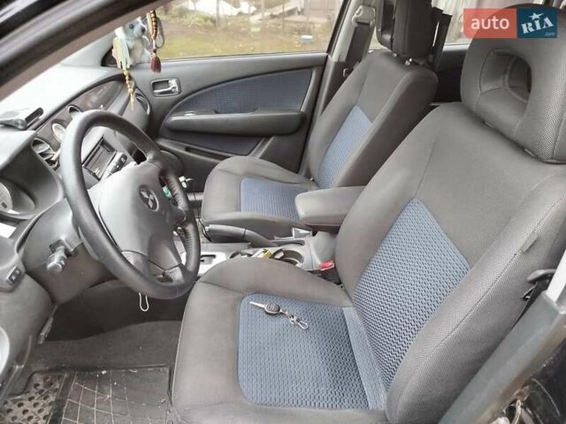 Чорний Міцубісі Аутлендер, об'ємом двигуна 2.38 л та пробігом 149 тис. км за 8800 $, фото 7 на Automoto.ua