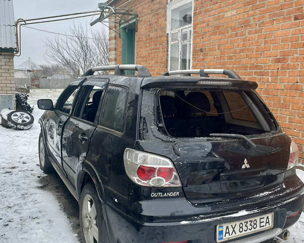 Черный Мицубиси Аутлендер, объемом двигателя 2 л и пробегом 109 тыс. км за 1550 $, фото 2 на Automoto.ua