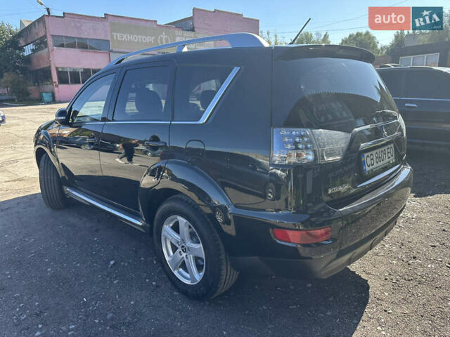 Черный Мицубиси Аутлендер, объемом двигателя 2 л и пробегом 240 тыс. км за 10999 $, фото 8 на Automoto.ua