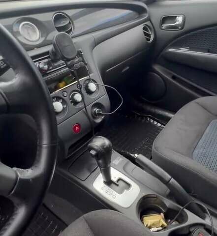 Черный Мицубиси Аутлендер, объемом двигателя 2.38 л и пробегом 220 тыс. км за 7500 $, фото 8 на Automoto.ua