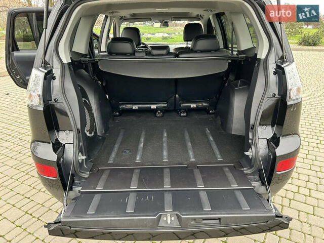 Черный Мицубиси Аутлендер, объемом двигателя 3 л и пробегом 77 тыс. км за 11800 $, фото 14 на Automoto.ua