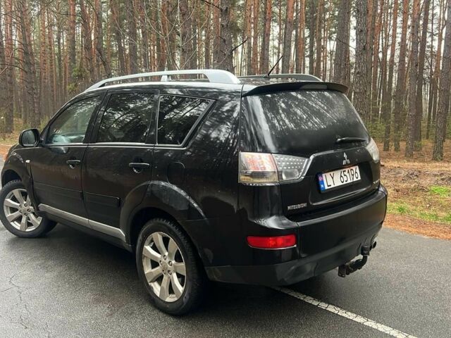 Черный Мицубиси Аутлендер, объемом двигателя 2 л и пробегом 280 тыс. км за 4500 $, фото 3 на Automoto.ua