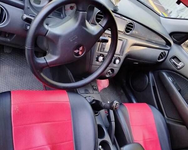 Черный Мицубиси Аутлендер, объемом двигателя 2 л и пробегом 223 тыс. км за 7200 $, фото 4 на Automoto.ua