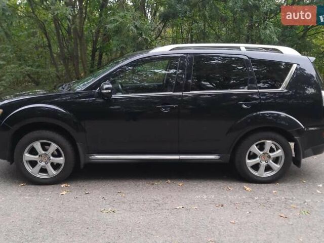 Чорний Міцубісі Аутлендер, об'ємом двигуна 2 л та пробігом 220 тис. км за 10700 $, фото 2 на Automoto.ua