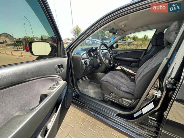 Черный Мицубиси Аутлендер, объемом двигателя 2 л и пробегом 236 тыс. км за 6699 $, фото 14 на Automoto.ua
