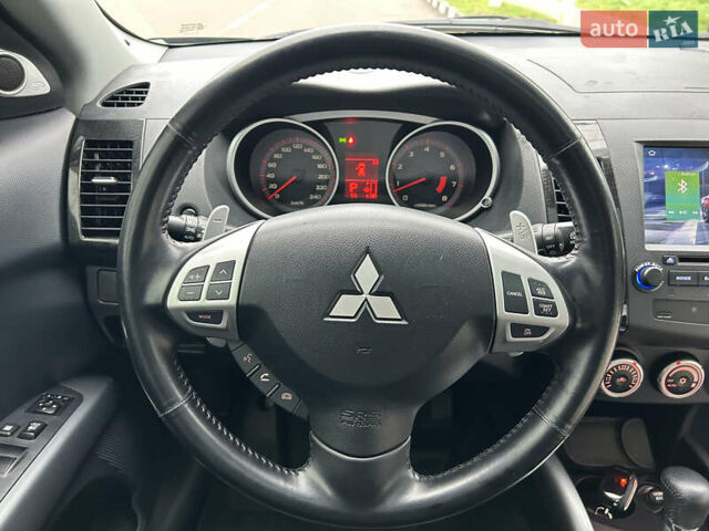 Черный Мицубиси Аутлендер, объемом двигателя 3 л и пробегом 77 тыс. км за 11800 $, фото 32 на Automoto.ua