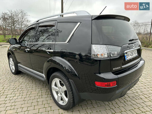 Черный Мицубиси Аутлендер, объемом двигателя 3 л и пробегом 77 тыс. км за 11800 $, фото 4 на Automoto.ua