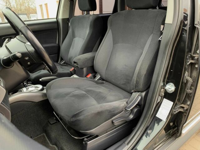 Черный Мицубиси Аутлендер, объемом двигателя 2.4 л и пробегом 175 тыс. км за 10499 $, фото 10 на Automoto.ua