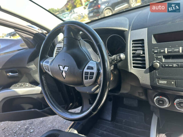 Черный Мицубиси Аутлендер, объемом двигателя 2 л и пробегом 240 тыс. км за 10999 $, фото 30 на Automoto.ua
