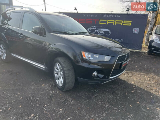 Черный Мицубиси Аутлендер, объемом двигателя 2.36 л и пробегом 244 тыс. км за 9850 $, фото 15 на Automoto.ua
