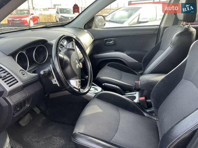 Чорний Міцубісі Аутлендер, об'ємом двигуна 2.36 л та пробігом 244 тис. км за 9850 $, фото 9 на Automoto.ua