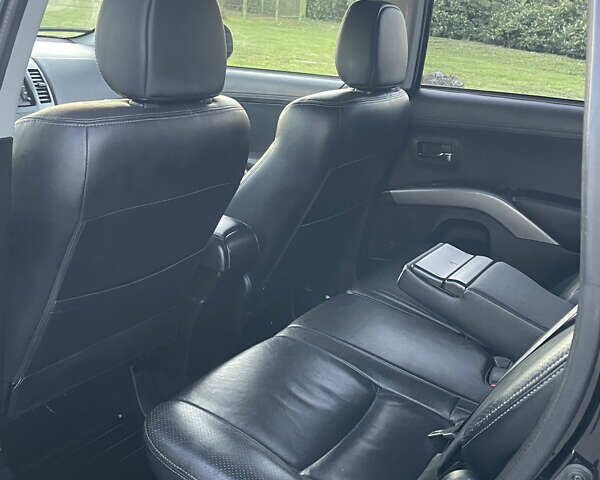 Черный Мицубиси Аутлендер, объемом двигателя 0 л и пробегом 257 тыс. км за 10399 $, фото 20 на Automoto.ua