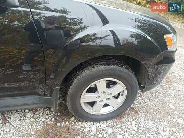 Черный Мицубиси Аутлендер, объемом двигателя 3 л и пробегом 240 тыс. км за 9500 $, фото 5 на Automoto.ua