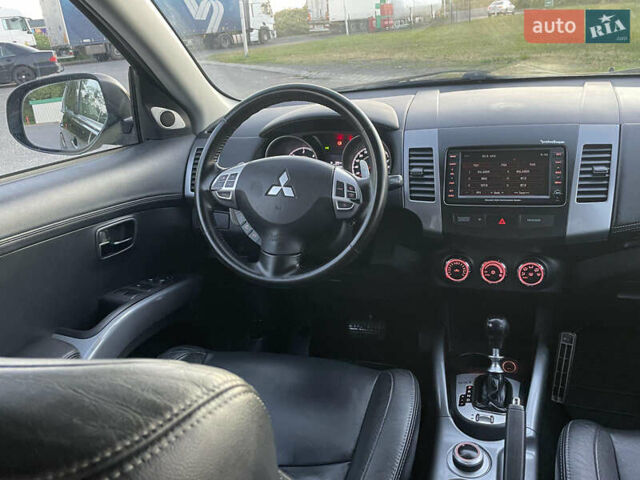 Черный Мицубиси Аутлендер, объемом двигателя 0 л и пробегом 257 тыс. км за 10399 $, фото 19 на Automoto.ua
