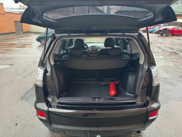 Черный Мицубиси Аутлендер, объемом двигателя 2.4 л и пробегом 305 тыс. км за 10000 $, фото 9 на Automoto.ua