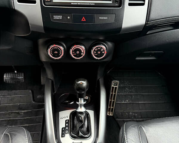 Черный Мицубиси Аутлендер, объемом двигателя 2.2 л и пробегом 257 тыс. км за 11000 $, фото 65 на Automoto.ua