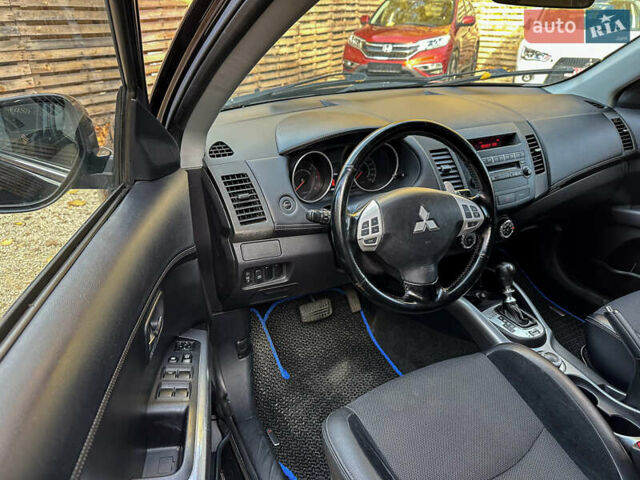 Черный Мицубиси Аутлендер, объемом двигателя 2.2 л и пробегом 226 тыс. км за 11500 $, фото 59 на Automoto.ua
