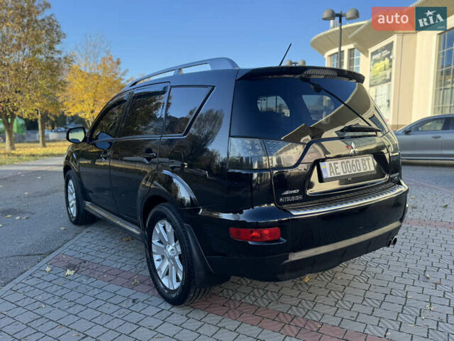 Черный Мицубиси Аутлендер, объемом двигателя 3 л и пробегом 162 тыс. км за 10800 $, фото 7 на Automoto.ua