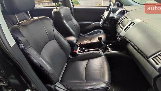 Черный Мицубиси Аутлендер, объемом двигателя 2 л и пробегом 210 тыс. км за 10600 $, фото 17 на Automoto.ua