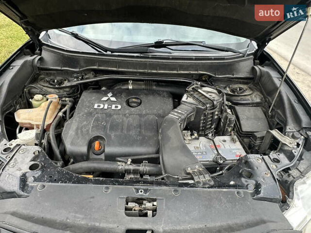 Черный Мицубиси Аутлендер, объемом двигателя 1.97 л и пробегом 224 тыс. км за 9000 $, фото 15 на Automoto.ua