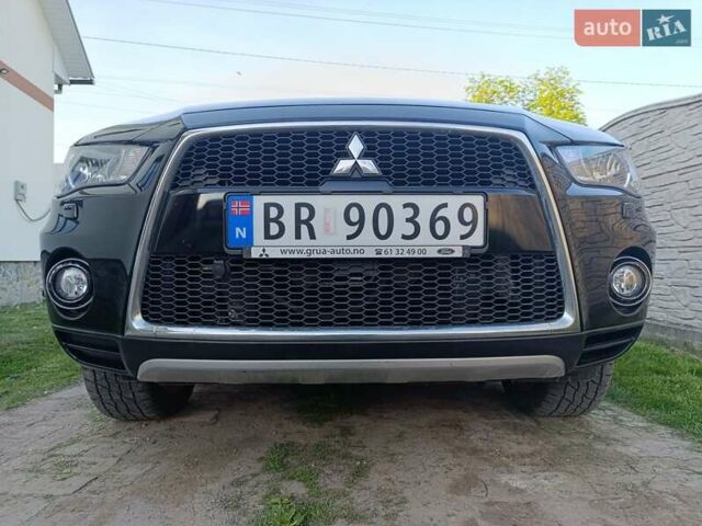 Чорний Міцубісі Аутлендер, об'ємом двигуна 2 л та пробігом 221 тис. км за 9500 $, фото 35 на Automoto.ua