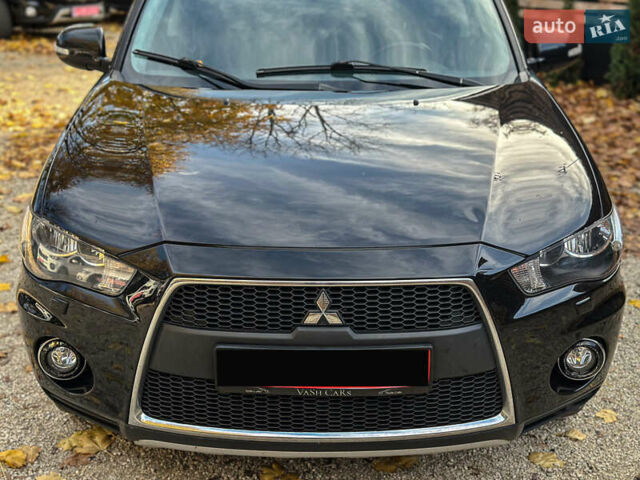 Черный Мицубиси Аутлендер, объемом двигателя 2.2 л и пробегом 226 тыс. км за 11500 $, фото 29 на Automoto.ua