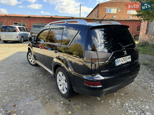 Чорний Міцубісі Аутлендер, об'ємом двигуна 2 л та пробігом 258 тис. км за 8699 $, фото 7 на Automoto.ua