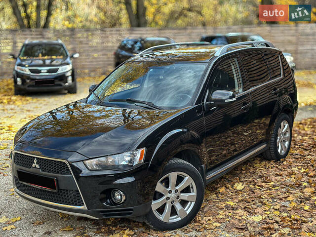 Черный Мицубиси Аутлендер, объемом двигателя 2.2 л и пробегом 226 тыс. км за 11500 $, фото 14 на Automoto.ua