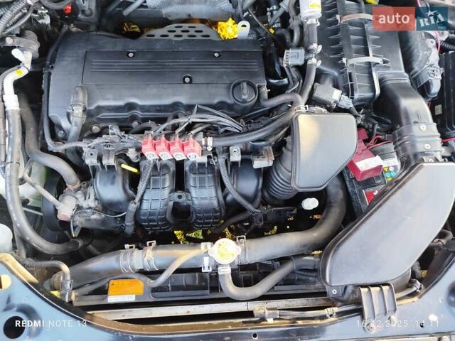 Черный Мицубиси Аутлендер, объемом двигателя 2 л и пробегом 261 тыс. км за 9700 $, фото 23 на Automoto.ua