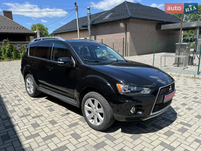 Чорний Міцубісі Аутлендер, об'ємом двигуна 2.2 л та пробігом 214 тис. км за 10600 $, фото 3 на Automoto.ua