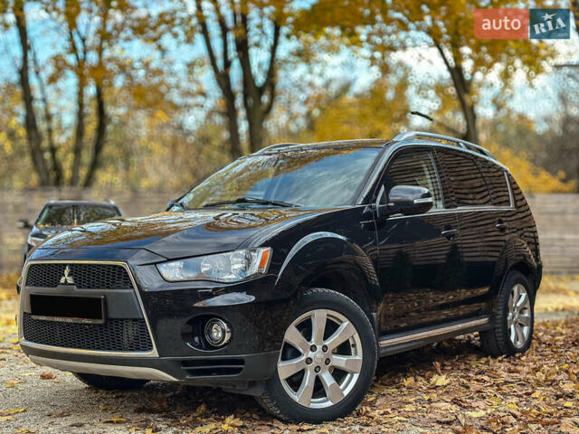 Черный Мицубиси Аутлендер, объемом двигателя 2.2 л и пробегом 226 тыс. км за 11500 $, фото 12 на Automoto.ua