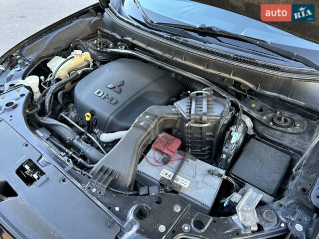 Черный Мицубиси Аутлендер, объемом двигателя 2.2 л и пробегом 263 тыс. км за 11300 $, фото 22 на Automoto.ua