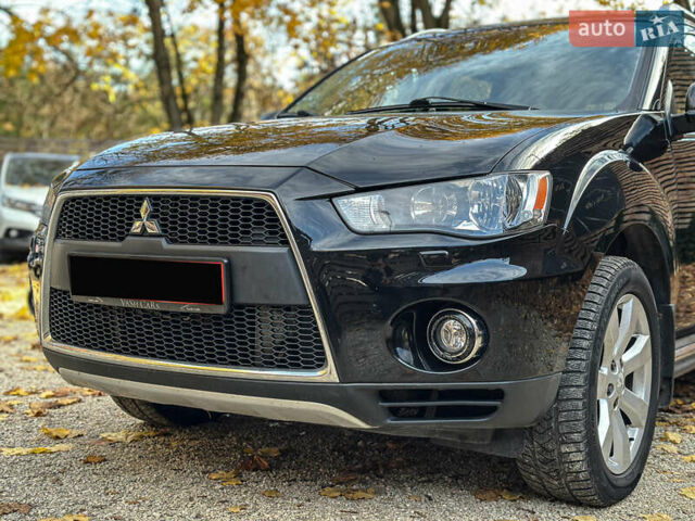 Черный Мицубиси Аутлендер, объемом двигателя 2.2 л и пробегом 226 тыс. км за 11500 $, фото 30 на Automoto.ua