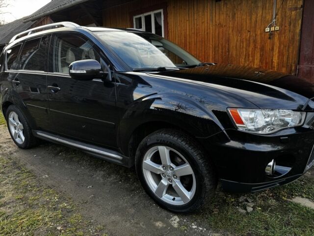 Черный Мицубиси Аутлендер, объемом двигателя 2.2 л и пробегом 249 тыс. км за 11500 $, фото 8 на Automoto.ua