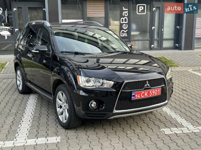 Черный Мицубиси Аутлендер, объемом двигателя 2.2 л и пробегом 225 тыс. км за 10950 $, фото 29 на Automoto.ua