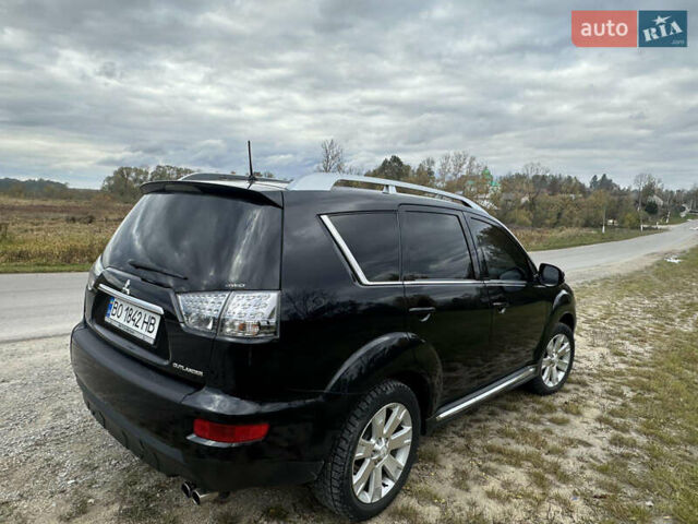 Черный Мицубиси Аутлендер, объемом двигателя 1.97 л и пробегом 224 тыс. км за 9000 $, фото 5 на Automoto.ua