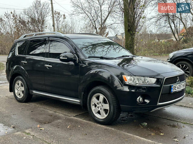 Чорний Міцубісі Аутлендер, об'ємом двигуна 2.36 л та пробігом 197 тис. км за 11300 $, фото 8 на Automoto.ua