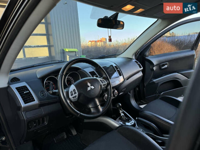 Черный Мицубиси Аутлендер, объемом двигателя 2.2 л и пробегом 263 тыс. км за 11300 $, фото 12 на Automoto.ua