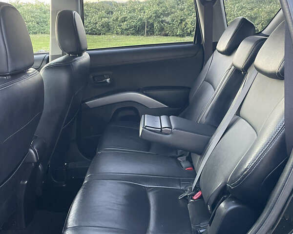 Черный Мицубиси Аутлендер, объемом двигателя 0 л и пробегом 257 тыс. км за 10399 $, фото 26 на Automoto.ua