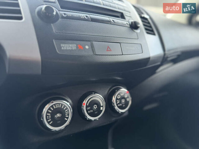 Черный Мицубиси Аутлендер, объемом двигателя 2.2 л и пробегом 225 тыс. км за 10950 $, фото 38 на Automoto.ua