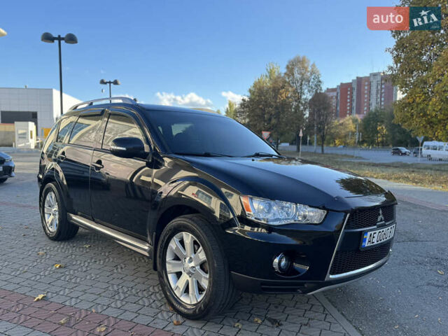 Черный Мицубиси Аутлендер, объемом двигателя 3 л и пробегом 162 тыс. км за 10800 $, фото 2 на Automoto.ua