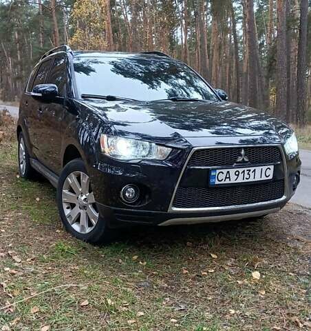 Черный Мицубиси Аутлендер, объемом двигателя 2.2 л и пробегом 267 тыс. км за 9999 $, фото 11 на Automoto.ua