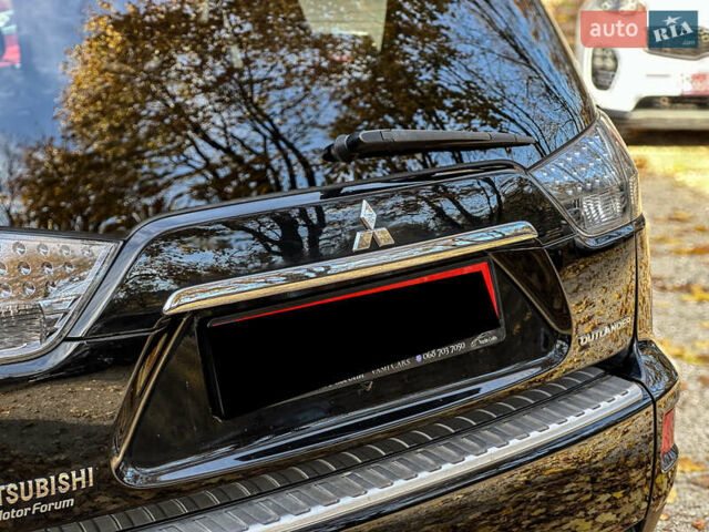 Черный Мицубиси Аутлендер, объемом двигателя 2.2 л и пробегом 226 тыс. км за 11500 $, фото 50 на Automoto.ua