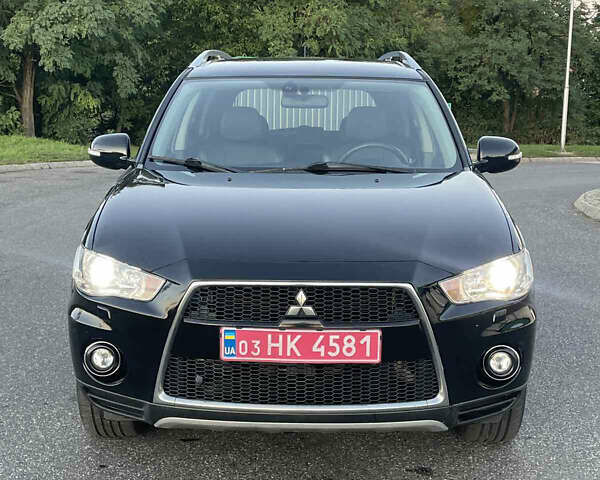 Черный Мицубиси Аутлендер, объемом двигателя 0 л и пробегом 257 тыс. км за 10399 $, фото 1 на Automoto.ua
