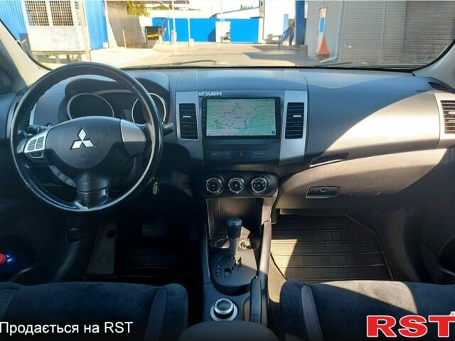 Чорний Міцубісі Аутлендер, об'ємом двигуна 2 л та пробігом 291 тис. км за 11200 $, фото 3 на Automoto.ua