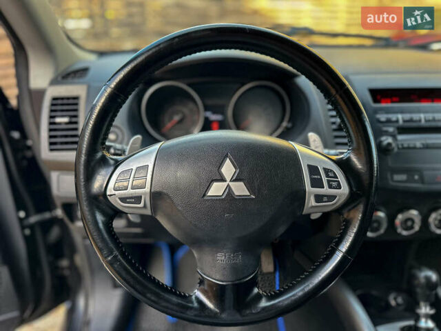 Черный Мицубиси Аутлендер, объемом двигателя 2.2 л и пробегом 226 тыс. км за 11500 $, фото 69 на Automoto.ua