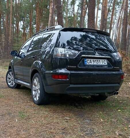 Черный Мицубиси Аутлендер, объемом двигателя 2.2 л и пробегом 267 тыс. км за 9999 $, фото 8 на Automoto.ua